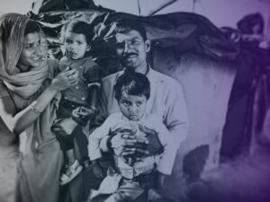 A family of four - parents with two young children